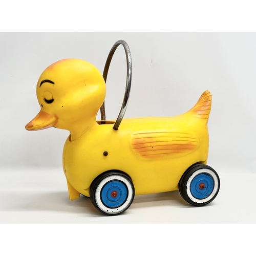 775 - A 1960’s Kitsch child’s ride on duck.