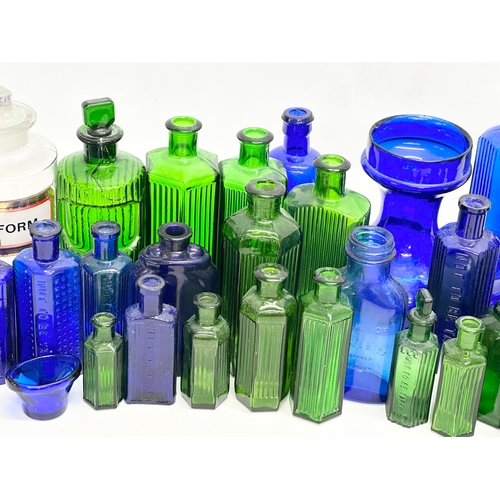 529 - A collection of vintage chemist bottles