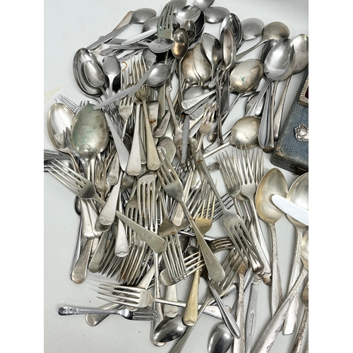 827 - A large quantity of silver plated cutlery.