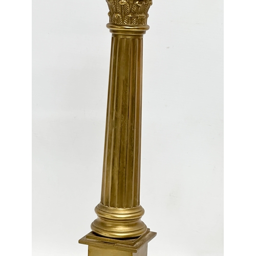 431 - A tall brass table lamp with Corinthian style column. By Laura Ashley. 49cm