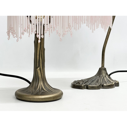 828 - 2 Tiffany style table lamps. 40cm. 38cm.