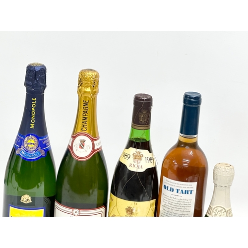 664 - 5 bottles of champagne and wine. Heidsiech & Co Monopole Blue Top etc.