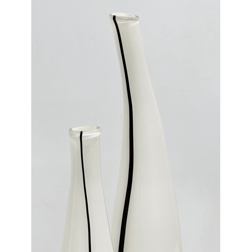 829 - A pair of large glass vases. Late 20th Century. 46cm. 34cm.