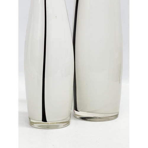 829 - A pair of large glass vases. Late 20th Century. 46cm. 34cm.