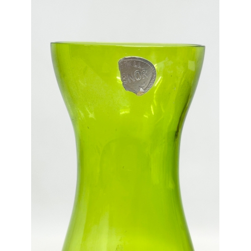 376 - A Norwegian Mid Century glass vase, by Magnor Glassworks. With label. 21cm.