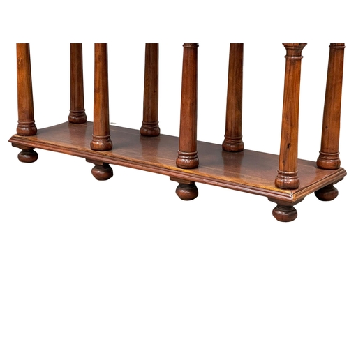 433 - An Early 19th Century style console table with 3 drawers, brass rosette mouldings and raised on bun ... 