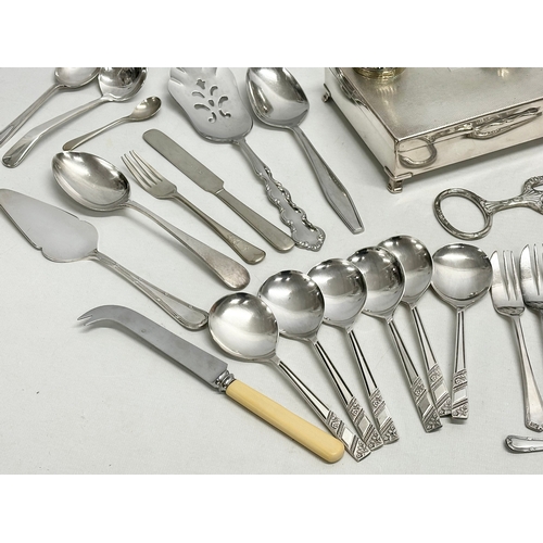 968 - A collection of silver plate and stainless steel. E.P and stainless cutlery. House of Marbles wine b... 