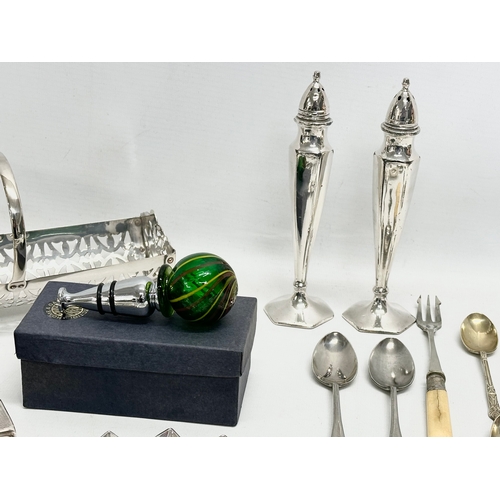 968 - A collection of silver plate and stainless steel. E.P and stainless cutlery. House of Marbles wine b... 