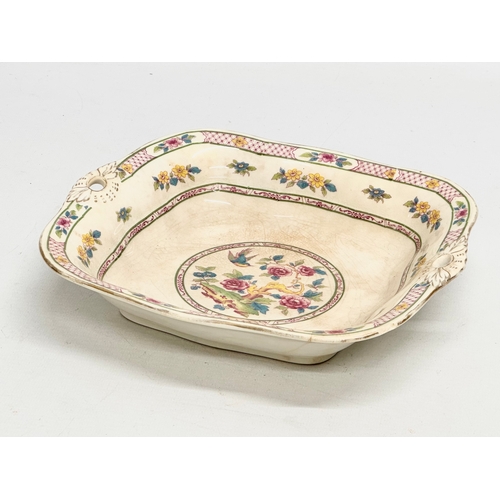 477 - Crown Staffordshire for R. Hogg & Co. An Early 20th Century pottery dish. Circa 1906-1910. 22.5x21.5... 