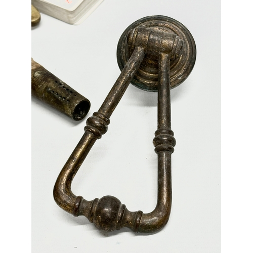 967 - A job lot of collectables. Two 19th Century beer keg taps, a Victorian door knocker, a cut throat ra... 