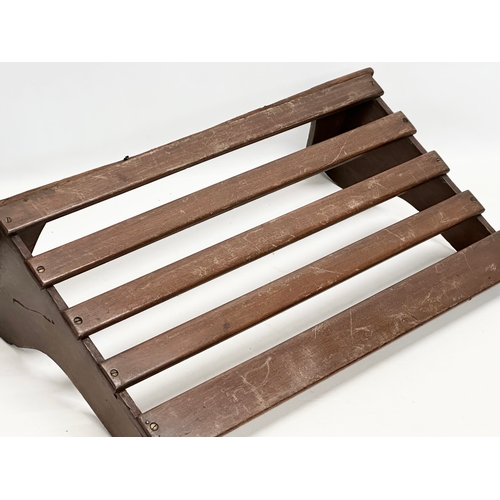 505B - An Early 20th Century railway luggage rack. 56x32cm.