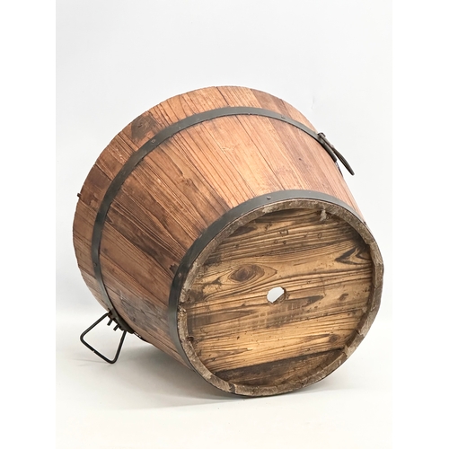 971 - A wooden barrel form planter. 46x32cm