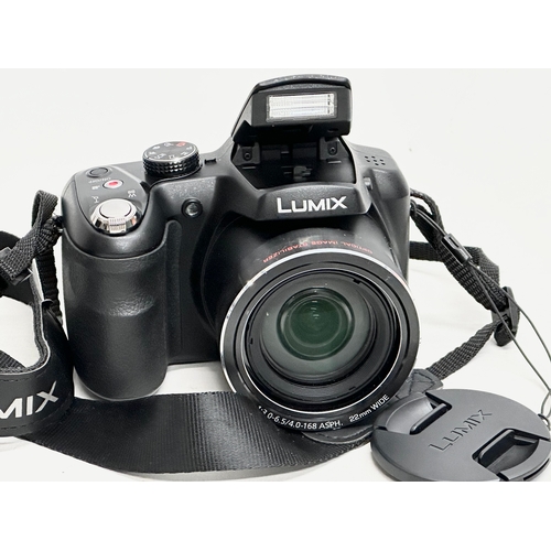 912 - A Lumix 42X Optical Zoom camera.