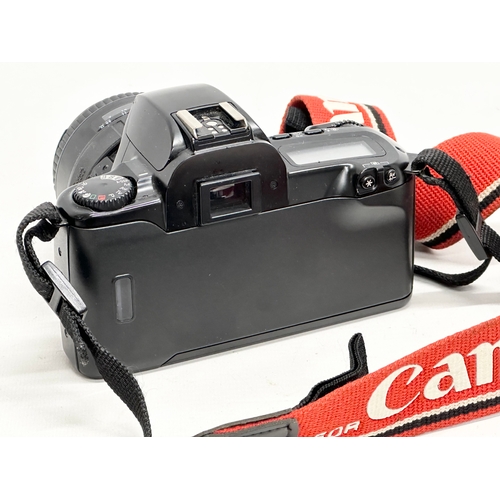 913 - A Canon EOS 500 camera.