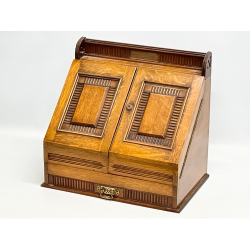 275 - A Late 19th Century Victorian oak, desk top stationary cabinet, with fitted interior. Closed 40x26x3... 