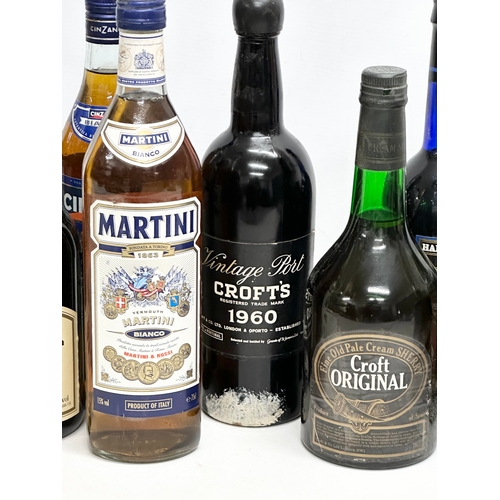 706 - A quantity of alcohol. Brandy, Port, Sherry etc