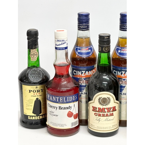 706 - A quantity of alcohol. Brandy, Port, Sherry etc