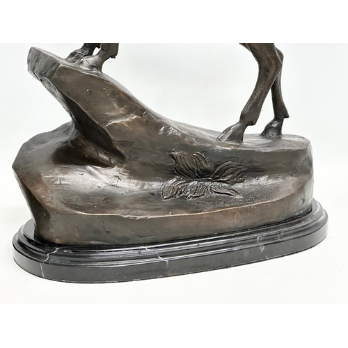 3 - A pair of large bronze stags on marble bases, after J. Moignier. 34x19x66cm