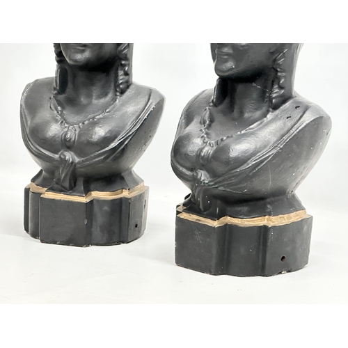 380 - A pair of Late 19th Century cast iron bust finials. 39cm