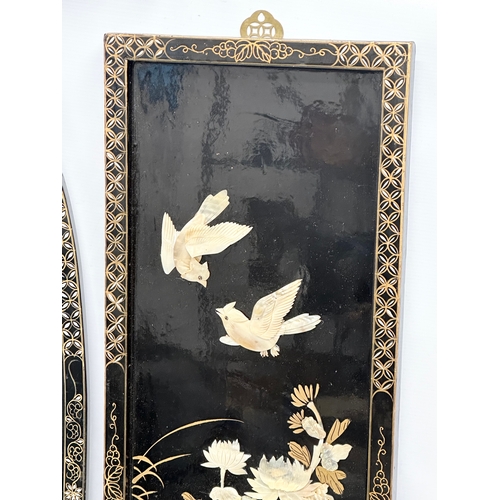 983 - Two Japanese lacquered wall plaques. 92cm