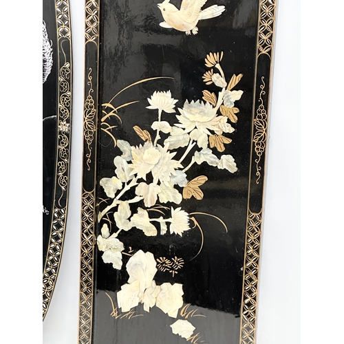 983 - Two Japanese lacquered wall plaques. 92cm