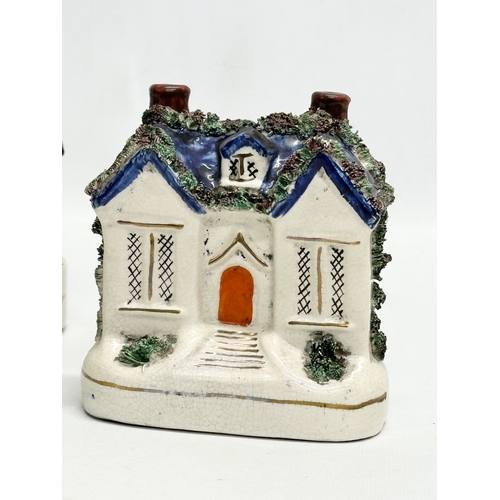 388 - Four 19th Century Victorian Staffordshire Pottery cottages. 12x16cm. 11x13cm.