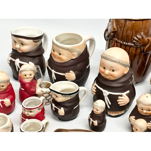 995 - A collection of West German M.J. Hummel Goebel Pottery Friars. Milk jugs, salt and pepper shakers et... 