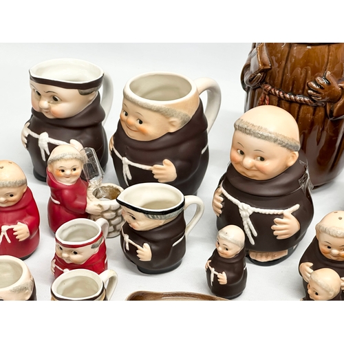 995 - A collection of West German M.J. Hummel Goebel Pottery Friars. Milk jugs, salt and pepper shakers et... 