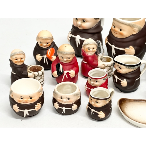 995 - A collection of West German M.J. Hummel Goebel Pottery Friars. Milk jugs, salt and pepper shakers et... 