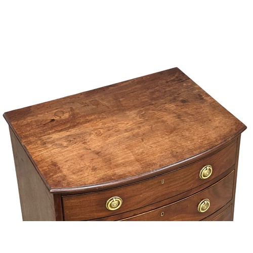 896 - A fine proportioned Mid 19th Century George III style mahogany bow front chest of drawers, on splaye... 