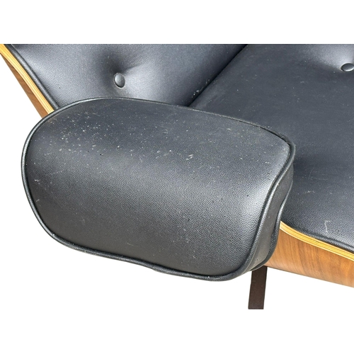 1 - A Charles & Ray Eames style leather swivel armchair and ottoman.