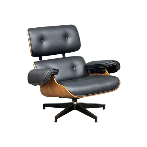 1 - A Charles & Ray Eames style leather swivel armchair and ottoman.