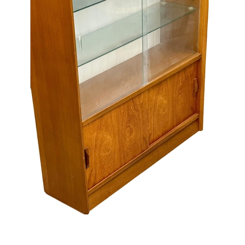 134 - Herbert Gibbs. A Mid Century teak bookcase. 1960’s. 91x28x113cm.