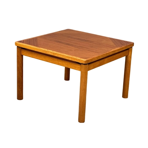 148 - A Danish Mid Century teak coffee table/side table. By Trioh Mobler. 59x59x42cm