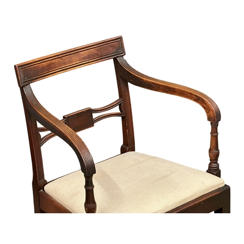 156 - A pair of Regency Period, Early 19th Century mahogany bar back armchairs. Circa 1810.