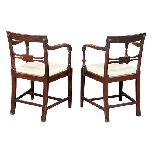 156 - A pair of Regency Period, Early 19th Century mahogany bar back armchairs. Circa 1810.