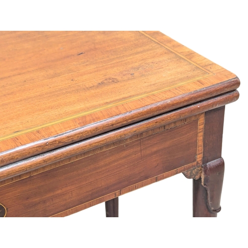 199 - A Late 18th Century George III inlaid mahogany games table. Circa 1790-1800. 80x40x72.5cm