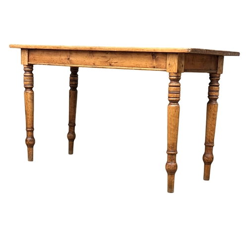 226 - A 19th Century Victorian pine farmhouse preparation table with turned legs. Circa 1880. 122x51x69cm