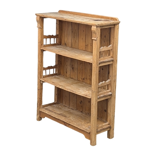 266 - A 19th Century Victorian pine shelving unit. 94.5x33.5x125cm