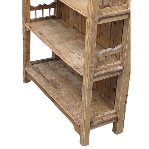 266 - A 19th Century Victorian pine shelving unit. 94.5x33.5x125cm