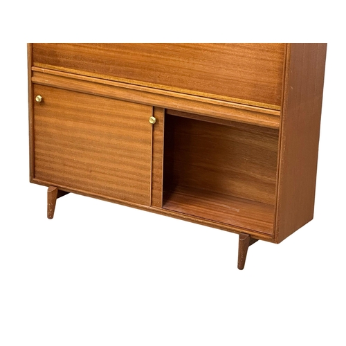 272 - Robert Heritage for Beaver & Tapley. A Mid Century teak “Multi-Width” cocktail cabinet/bar cabinet, ... 