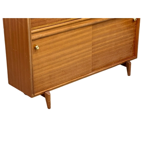 272 - Robert Heritage for Beaver & Tapley. A Mid Century teak “Multi-Width” cocktail cabinet/bar cabinet, ... 