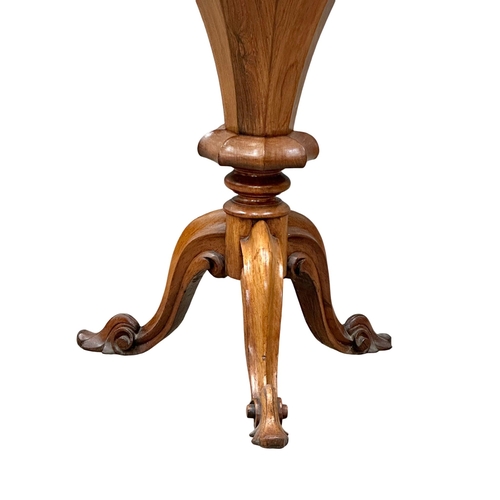 297 - A 19th Century Victorian rosewood work table on pedestal base. Circa 1860-1870. 45x73cm