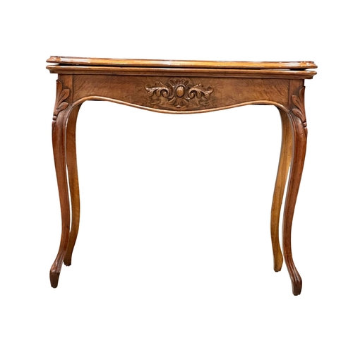 298 - A Mid 19th Century North European walnut turnover games table. French/Belgian. 83x42x73.5cm. 1