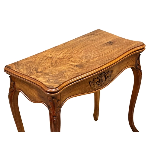 298 - A Mid 19th Century North European walnut turnover games table. French/Belgian. 83x42x73.5cm. 1