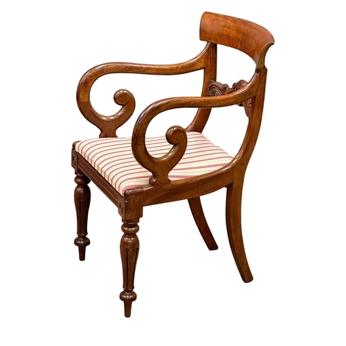 307 - A William IV mahogany bar back armchair with scrolled arms. Circa 1830. (7)