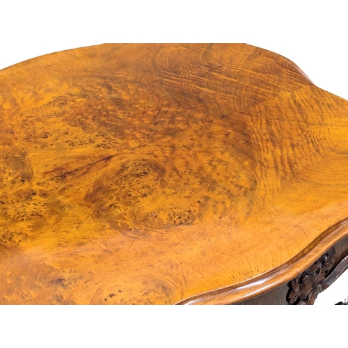 311 - A Victorian Burr Walnut centre table / side table with scallop shaped edge. Circa 1850s. 82x55x75cm