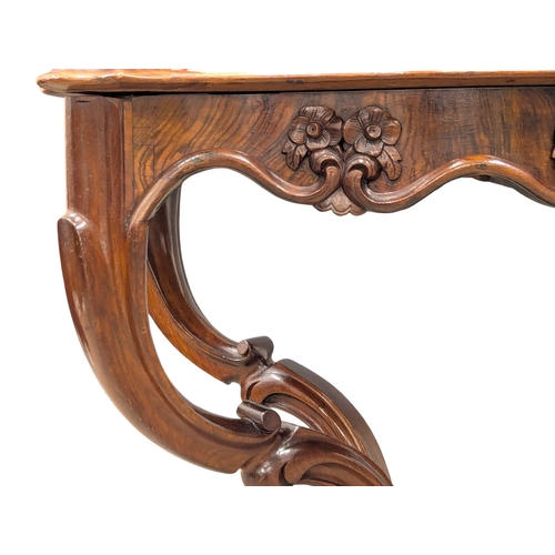 311 - A Victorian Burr Walnut centre table / side table with scallop shaped edge. Circa 1850s. 82x55x75cm