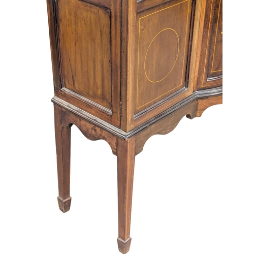 312 - An Edwardian inlaid mahogany display cabinet with bow front panel. 109x34x174cm. (5)