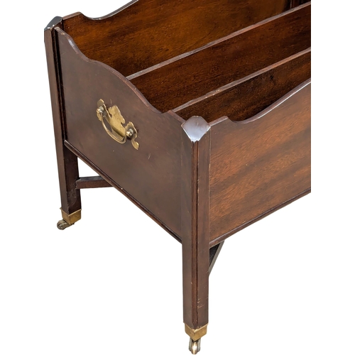 323 - An Early 20th Century George III style mahogany Canterbury. (3)